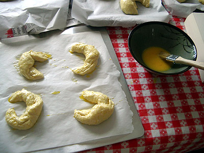 egg washing croissants