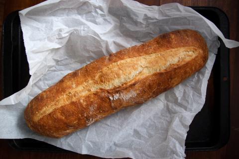 top view of rustic italian loaf of bread 