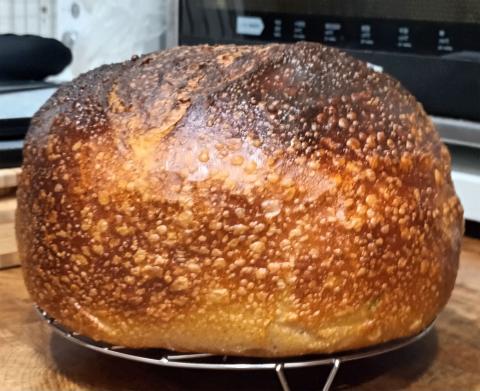 Overproofed  and baked in a Stainless pot