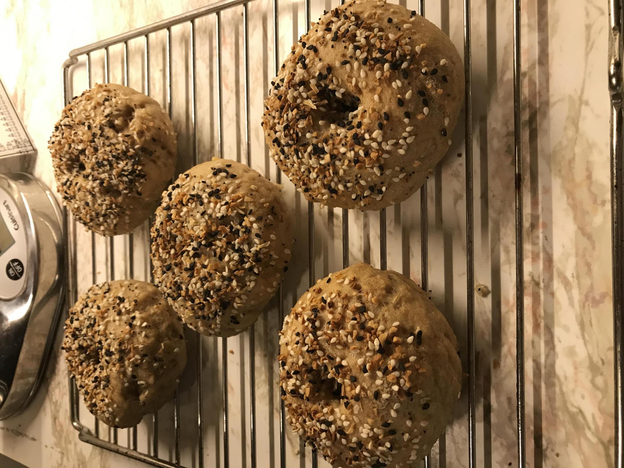 Bagels cooling on rack.