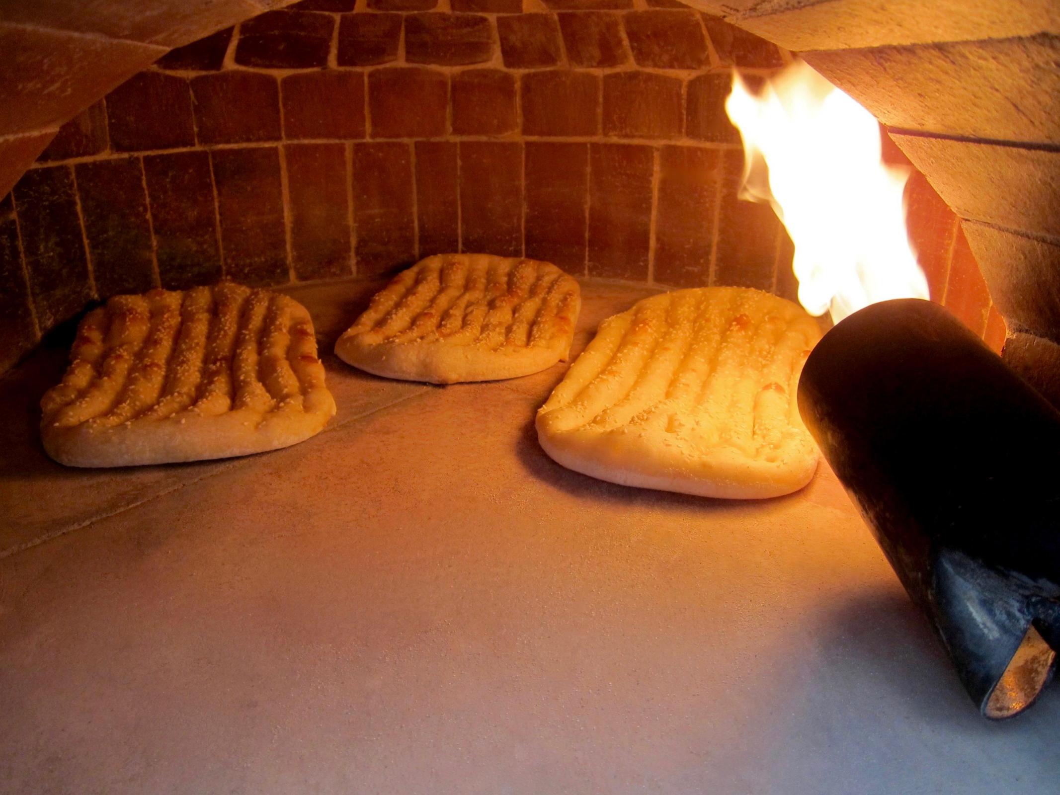 Baking bread in clay oven  BakingTanoori bread in isfahan 