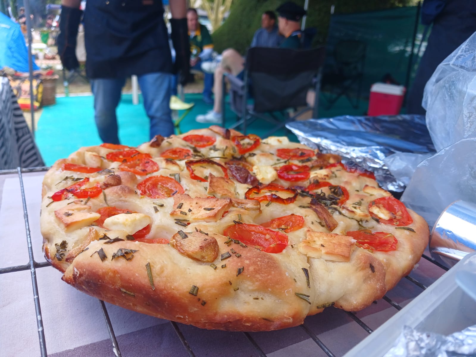 Focaccia cooling, didn't stint on toppings!